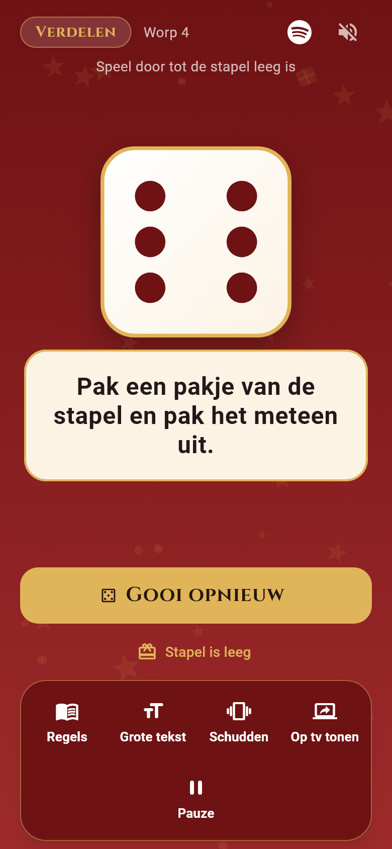 Het echte spelscherm van Pakjesavond: de fase Verdelen, een dobbelsteen en de opdracht voor de worp.